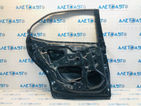 Door bare rear left Toyota Camry v70 18- OEM dented corner
