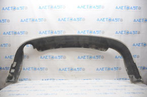The rear bumper lip of Ford Fusion mk5 13-18 under 1 pipe is rubbed
