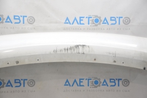 The rear bumper lip of Ford Fusion mk5 13-18 under 1 pipe is rubbed