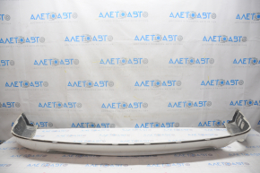 The rear bumper lip of Ford Fusion mk5 13-18 under 1 pipe is rubbed