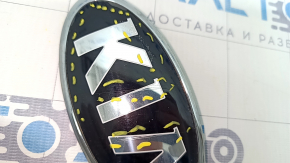 Emblem badge KIA front bumper Kia Niro 17-22 air on the edge, scratches
