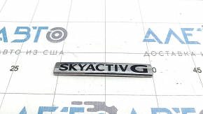 Emblem inscription SKYACTIV G trunk lid Mazda 3 19- 4d