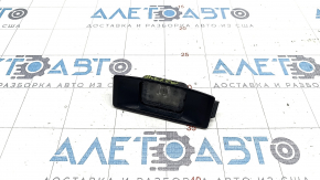 Rear bumper number plate light left Mazda 3 19- 4d