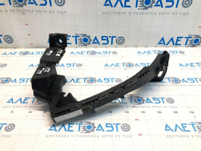 Front bumper mount for headlight left Subaru b10 Tribeca