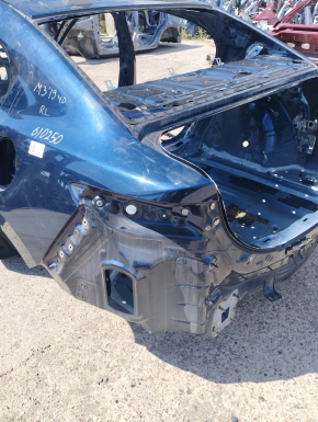 Quarter wing rear left Mazda 3 19-4d, blue, on the body, dented, bumps