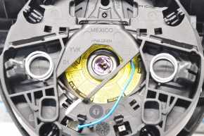 Airbag in the steering wheel driver VW Passat b7 12-15 USA the outline of the airbag is visible