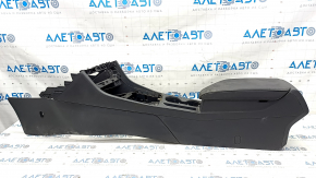 Central console armrest and cup holders VW Jetta 19 - black leather, scratches, needs cleaning, tear