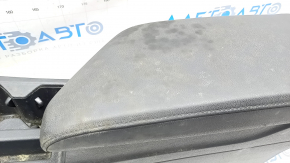 Central console armrest and cup holders VW Jetta 19 - black leather, scratches, needs cleaning, tear