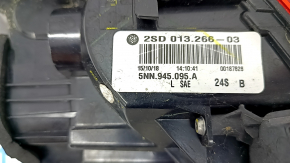 Light outer wing left VW Tiguan 18-usa, worn, debris inside