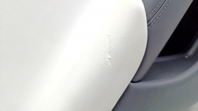 Door trim card rear left Tesla Model S 21 - white leather, with window lift control, dented leather, crack in fastening