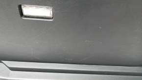 Right arch trim Ford Edge 15 - black, under subwoofer, scratches, plastic turned white, broken fastening
