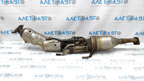 The inlet pipe with a catalytic converter Lexus CT200h 11-17 is rusty, the catalytic converter is dented