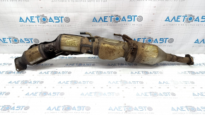The inlet pipe with a catalytic converter Lexus CT200h 11-17 is rusty, the catalytic converter is dented