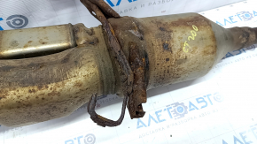 The inlet pipe with a catalytic converter Lexus CT200h 11-17 is rusty, the catalytic converter is dented