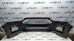 Front bumper bare Ford Fusion mk5 19-20 without parking sensors and towing hook, blue FT, rubbed