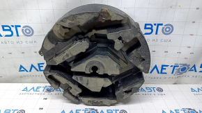 Foam plastic under the Chevrolet Malibu 16 tool is torn, dented