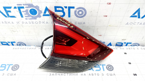 Light inside trunk lid left Nissan Rogue 17- worn