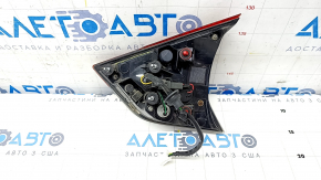 Light inside trunk lid left Nissan Rogue 17- worn