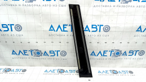 Door trim side front left Nissan Rogue 21-23 black gloss