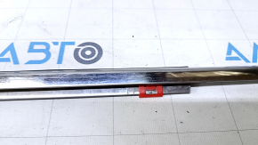 Molding door-glass central front left Lexus GS300 GS350 GS430 GS450h 06-11 chrome, scratches