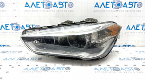 Headlight front left complete BMW X1 F48 16-19 LED, sand, cobweb, scratch, crack in glass