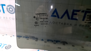 Glass of the rear left door of Jeep Cherokee KL 14 - factory tint, chips