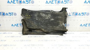 The rear left underbody protection of the Audi A6 C7 12-18 is torn and pressed