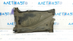 The rear left underbody protection of the Audi A6 C7 12-18 is torn and pressed