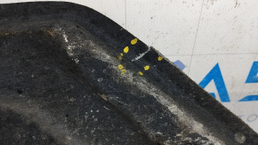 The rear right underbody protection of the Audi A6 C7 12-18 is torn