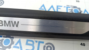 Door sill trim front left BMW X5 G05 19-23 black with chrome insert BMW, backlight, scratches