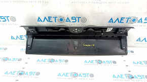 Jeep Compass 17 trunk opening trim - black scratches, dent