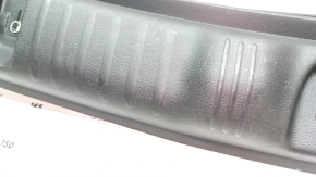 Jeep Compass 17 trunk opening trim - black scratches, dent