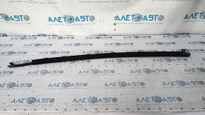Molding door-glass central front left Ford Mustang mk6 15- matt, tear, deformed