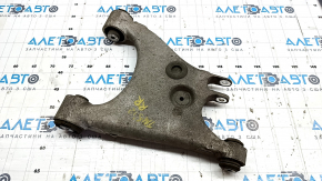 Tesla Model S 12-20 lower rear right control arm, torn silent block, microcracks in the silent block