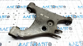 Tesla Model S 12-20 lower rear right control arm, torn silent block, microcracks in the silent block