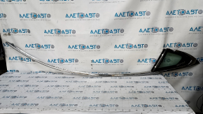 Upper right door molding Tesla Model S 12-20 chrome, with a window, the window has come off
