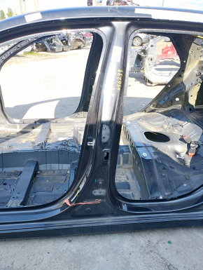 Central left body pillar Hyundai Elantra 21-23 on the body, bumps