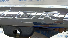 Ford Explorer 20 trunk door molding - under camera, scratches