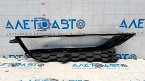 Front bumper grille left VW Passat b7 12-15 USA under fog lights, with molding, crack in mount