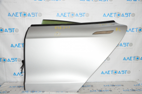 Door assembly rear left Tesla Model S 12-15 pre-rest, silver PMSS, scratches on the chrome handle, peeled paint