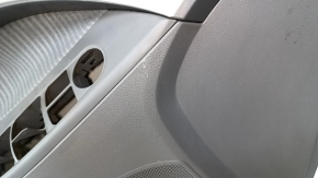 Door trim card front left Hyundai Elantra UD 11-13 prerest gray, insert gray cloth with perforation, armrest leather. faded plastic, needs cleaning, scratches, abrasions