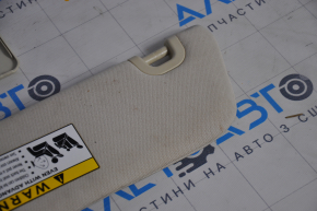 Right visor Tesla Model S 12-20 base, beige, cracked mount, chemically treated, broken lid fasteners