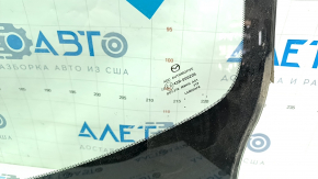 Windshield Mazda 3 19 - under camera and rain sensor, Mexico built, air on edge, broken mount
