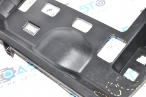 Tesla Model S 12-20 lower passenger footwell dashboard trim scratches, dented mount used