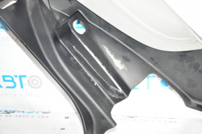 Lower left rear pillar trim Tesla Model S 12-15 pre-restoration, type 1, black, with gray insert, scratches, scuffs, tears, used