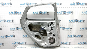 Door bare rear left Ford Focus mk3 11-18 silver UX dents, made