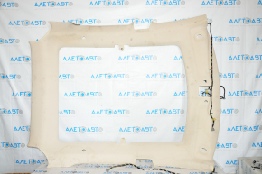 Tesla Model S 12-15 ceiling trim pre-restoration, under panorama, beige, under chemical treatment, tear of fastening, fabric peeled off