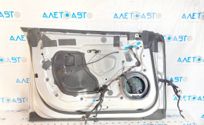 Door assembly front left Tesla Model S 12-15 pre-rest, silver PMSS, bump, scratches on chrome handle