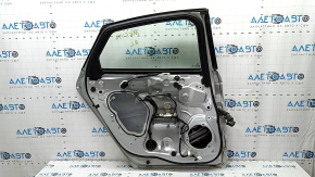 Door assembly rear left Ford Fusion mk5 13-20 silver UX, dent