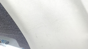 Left arch trim Lincoln MKC 15 - beige with dark gray, under subwoofer, scratches, broken fasteners, needs cleaning